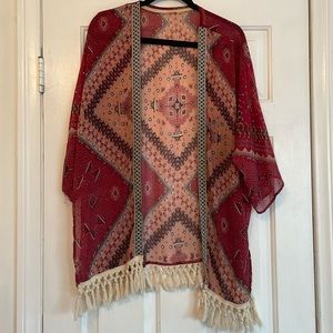 Nice open front blouse with fringe. South west look. Fits XL